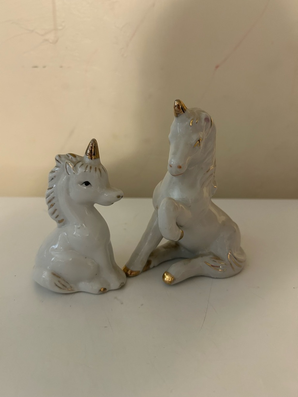 Vintage Pair Of Ceramic Unicorns White and gold
